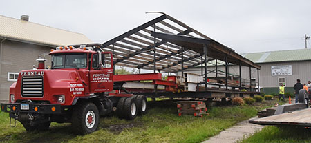 Donated shelter makes its journey to Sand Lake | News, Sports, Jobs - Vimarsana News